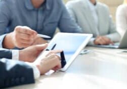 Business adviser analyzing financial figures denoting the progress in the work of the company